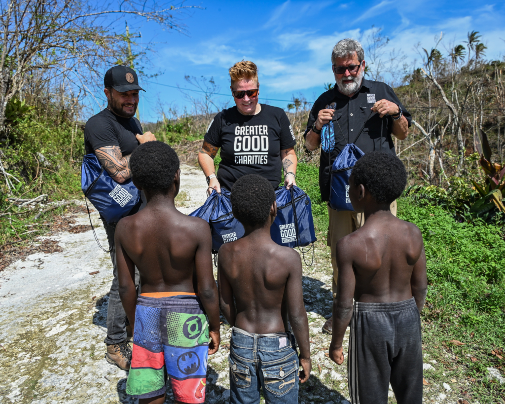 Greater Good Charities staff delivering essential aid to children in Jamaica after Hurricane Melissa